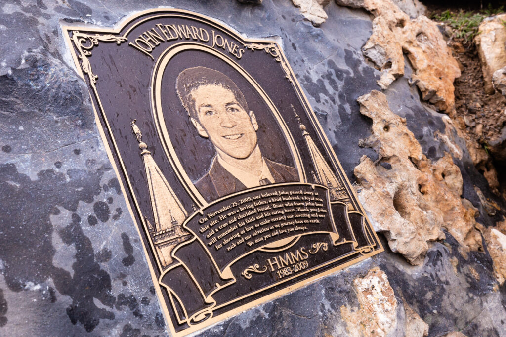 A plaque in remembrance of John Jones near the entrance to Nutty Putty Cave.